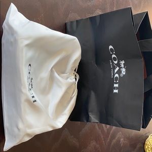 Coach black leather over the shoulder bag.